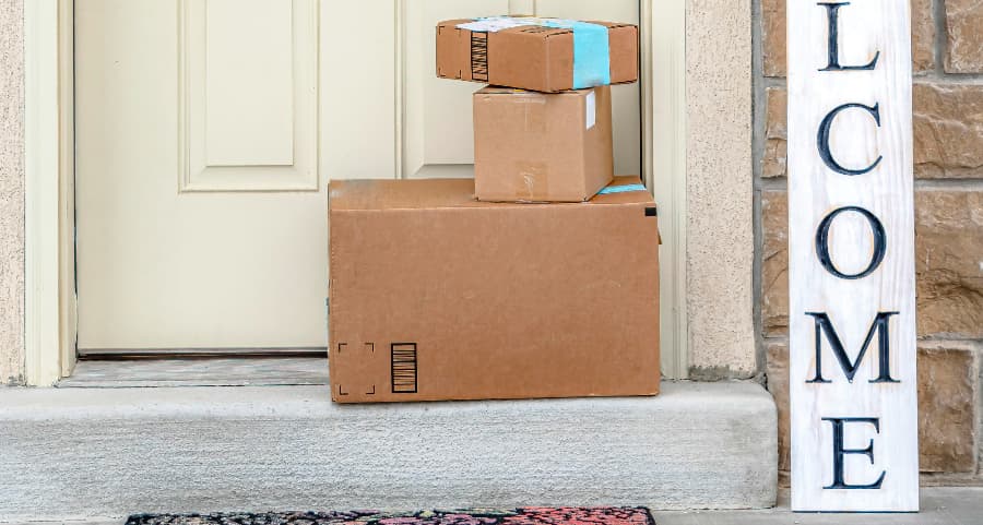 Deliveries on the front porch of a house with a welcome sign in York